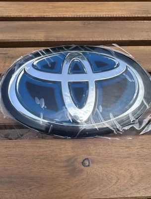 Toyota Sienna гибридный OEM 2021-2023 передняя решетка эмблема логотип радар 90975-C2022 - Изображение 1 из 4