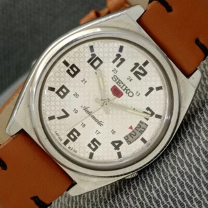 VINTAGE SEIKO 5 AUTOMATIC 7019A JAPAN MENS DATE SILVER COLOR DIAL WATCH a1090-A - Imagen 1 de 10