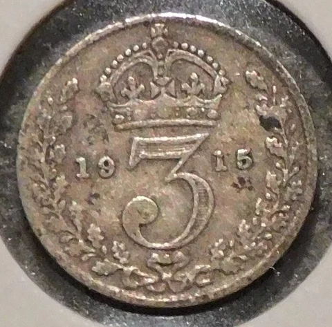 British Silver Threepence - 1915 (spotty tarnish) - King George V Cover