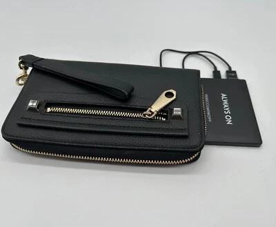 Cartera clutch grande Rebecca Minkoff de cuero negro con cremallera alrededor Foto 1 de 4