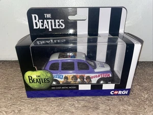 Corgi CC85935 The Beatles London Taxi 'Can't Buy Me Love' - Imagen 1 de 3