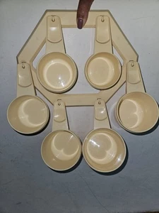 NOS Vintage Tupperware Measuring Cups Set of 6 Flat Almond w/ Wall Hanger - Picture 1 of 6
