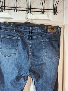 Wrangler Relaxed Fit Boot Cut Men's size 42x30 Dark Wash Blue Denim Jeans - Picture 1 of 7