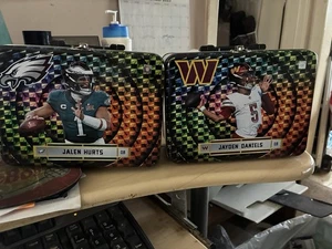 Mj Holding Jalen Hurts And Jayden Daniels Empty Tins - Picture 1 of 1