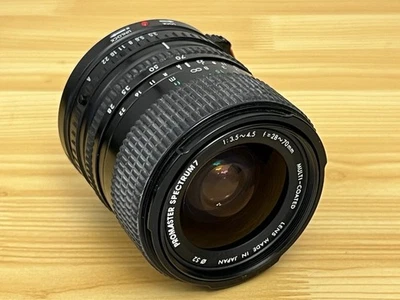 ProMaster Spectrum 7 MF 28-70mm f/3.5-4.5 Zoom Lens Canon FD Mount w/filter - Image 1 of 4