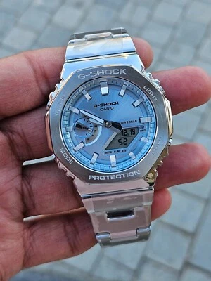 Reloj Casio G-SHOCK GM-2110D-2A de acero inoxidable - esfera azul helado - analógico para hombre - Foto 1 de 4