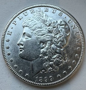 1899-O Morgan Silver Dollar - 90% US Coin-INV#7828 - Picture 1 of 2