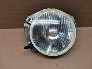 Phare  rond gauche ou droit pour volkswagen Polo de 79 a 90 !! neuf origine VW ! - Picture 1 of 4