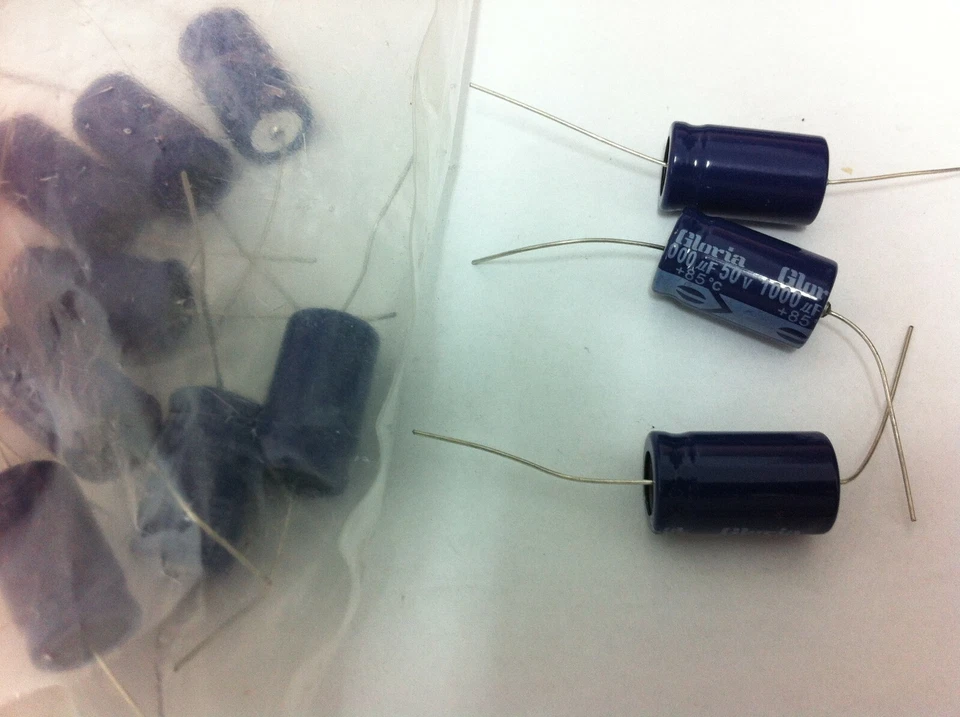 12 piezas - Condensadores electrolíticos radiales 1000uF 50V 85C 20% Foto 1 de 1