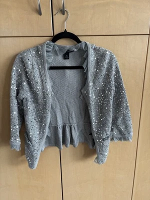 WHBM Cárdigan Abierto Lentejuelas Plateado con Volantes y Peplum Talla XS Foto 1 de 4