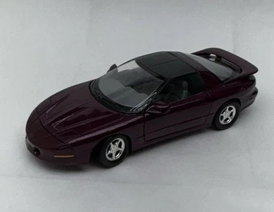 Литой автомобиль ERTL 1996 Pontiac Firebird Trans Am масштаб 1:18 фиолетовый - Изображение 1 из 4