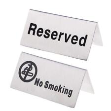 “No smoking / Reserved” sign in stainless steel