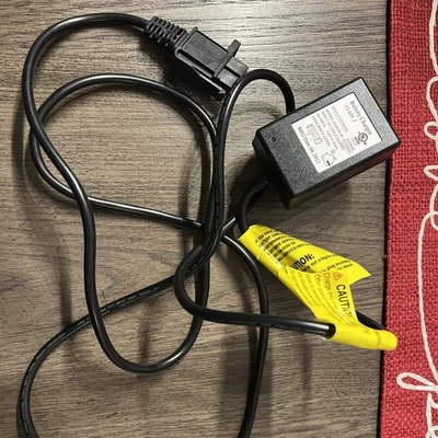 电子 SL06-04-01 电池充电器 Kid Trax / Motion Trends 7V---.8A  — 第 1/4 张图片