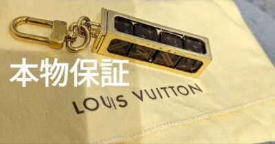Chaveiro Louis Vuitton × Supreme Dice marrom/dourado MP2072 LV Japão - Imagem 1 de 4