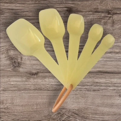 Retro 1980's Tupperware Nesting Measuring Spoons Set of 5 Yellow 1-25ml - Image 1 of 4