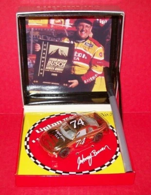 JOHNNY BENSON #74 1995 CHAMPION CHAMPION 1/64 MATCHBOX GOLD DIECAST CAR - Image 1 of 2