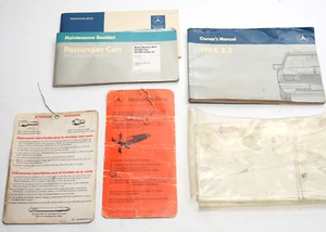 Mercedes W201 190E 2.3 Owner's Manual (see condition notes) - 1986 w/ pouch, etc - Picture 1 of 4