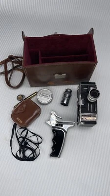 Paillard Bolex C8, cámara de película de 8 mm, lentes, agarre, medidor, carretes y estuche de cuero Foto 1 de 4