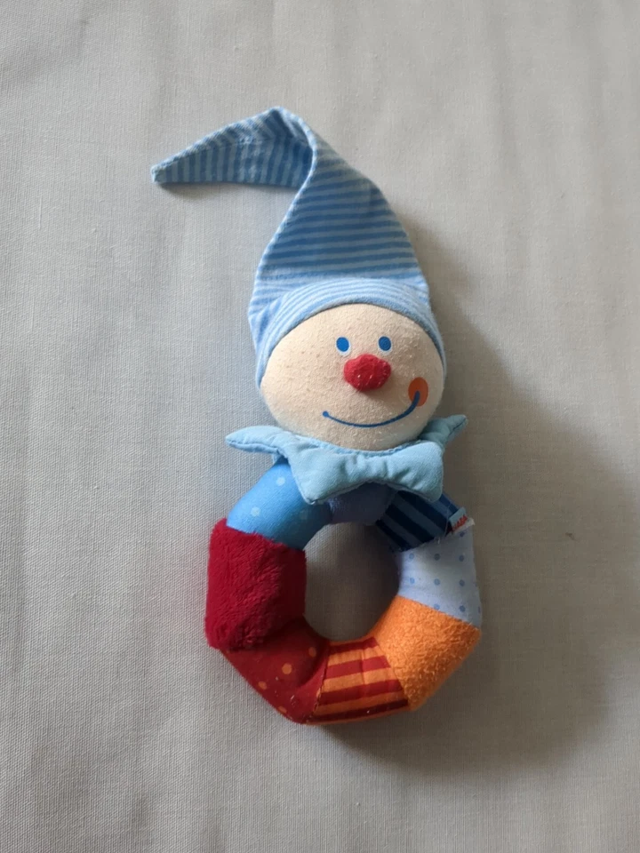 HABA Greifling Kasper Ringel Babyspiele Spiele Rasselring Rassel Ring Spielzeug - Bild 1 von 1