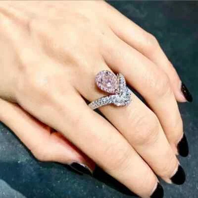 Anillo de compromiso de turmalina rosa simulada corte pera de 1,50 quilates de oro blanco de 14 quilates Foto 1 de 3