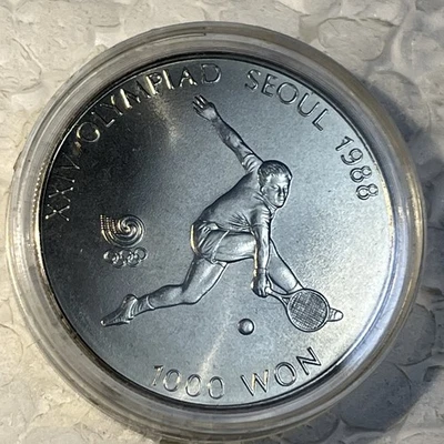 1987 South Korea 1000 Won Seoul 1988 Olympics Tennis BU Coin 560,000 Minted - Image 1 of 4