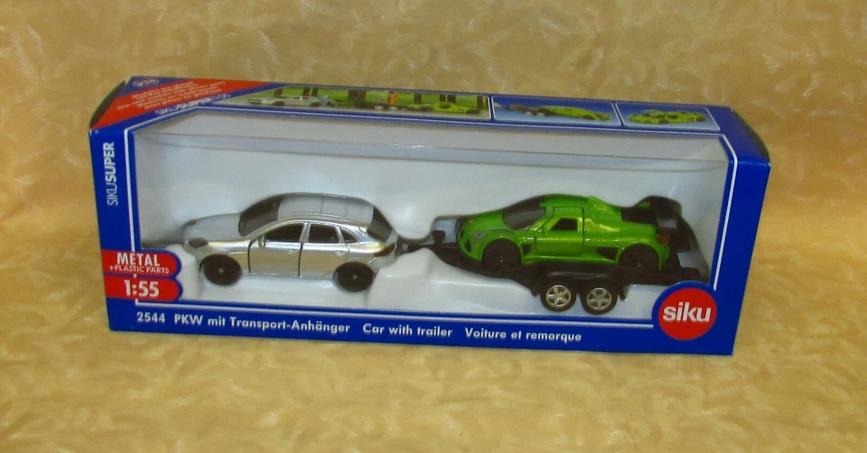 MODELLINO SIKU SUPER 1:55 n°2544 PORSCHE MACAN + CARRELLO+ GUMPERT cod.25468 - Immagine 1 di 1