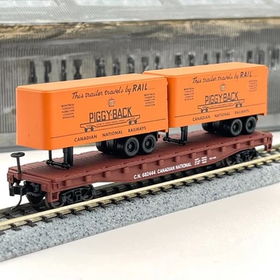 Atlas N Scale 37543 Canadian National Piggyback Flat Car with Trailers CN 682444 - Image 1 of 4