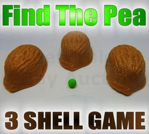 JUEGO FIND THE PEA 3 SHELL MEDIA CALLE NOGAL CON UNA ESTAFA PRIMER PLANO TRUCO MÁGICO NUEVO - Imagen 1 de 7