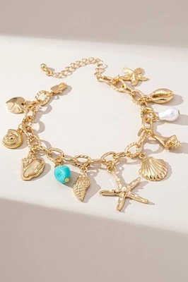 Pulsera ajustable con cuentas turquesa estrella de mar dorada Coastal Charm Foto 1 de 4