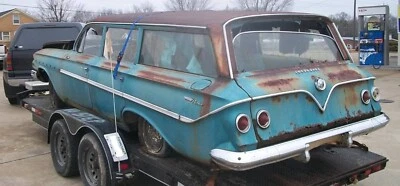 Par de piezas usadas de 1961 Chevy Parkwood Wagon exterior C pilar molduras cubiertas Foto 1 de 4