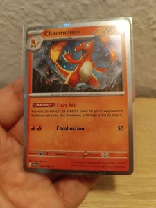 Charmeleon 008/091 Sv: Paldean Fates Cosmos Holo - Bild 1 von 3