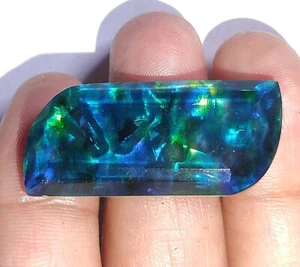 Ópalo de lujo ammolita natural 31,35 quilates - como doblete orgánico raro piedra preciosa suelta - Imagen 1 de 11