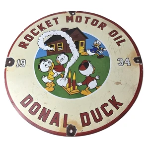 Vintage Rocket Motor Oil Sign - Donald Duck Gas Station Pump Porcelain Sign - Picture 1 of 14