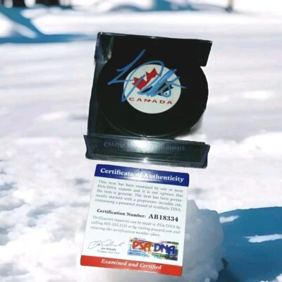 LUC ROBITAILLE SIGNED AUTOGRAPHED TEAM CANADA HOCKEY PUCK PSA/DNA #AB18334 BOLD  - Image 1 of 4