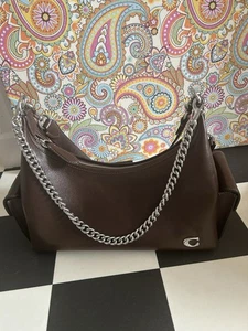 BOLSO DE MANO COACH JULIET 30 BOLSILLOS EN ARCE - Imagen 1 de 8