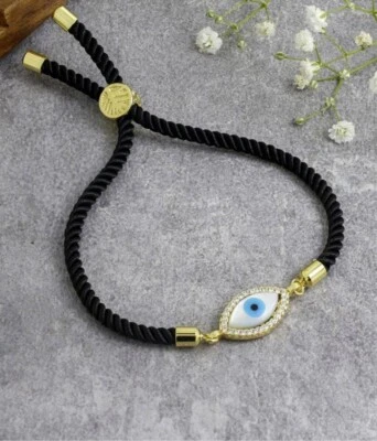 Pulsera de hilo madreperla mal de ojo Foto 1 de 2