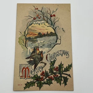 Vintage Frohe Weihnachten Postkarte mit Rotkehlchen Winterszene Stechpalme um 1910 - Bild 1 von 3