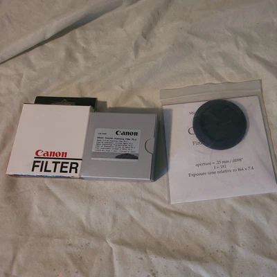Canon 58 mm polarizing and sky1A filter  1 canon EOS pinhole cap by christiansen - Image 1 of 4