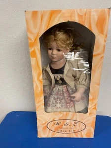 W.E. Porcelain Doll Item No: 22-123 - Picture 1 of 3