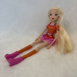 Jakks Pacific Winx Club 2012 Stella Believix Speedix Fairy Modepuppe blond - Bild 1 von 10