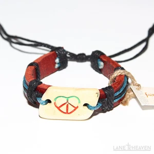Brazalete de cuero con dije corazón sobre piedra con símbolo de paz dentro del corazón 8" L - Imagen 1 de 1