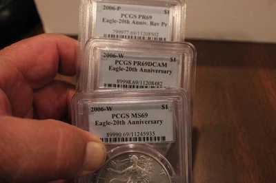2006  20TH ANNIVERSARY  PCGS PR69DCAM, MS69, PR69 REVERSE PR, SILVER EAGLE SET - Image 1 of 4
