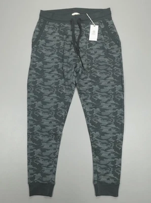 Calça jogger masculina Tasc Performance Varsity camuflagem bronze orgânica escovada - Imagem 1 de 4