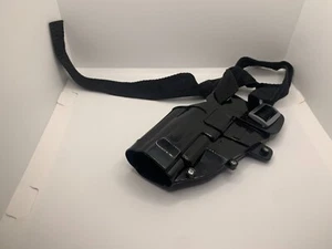 Disfraz negro plástico nailon funda de vestir para pistola - Imagen 1 de 2