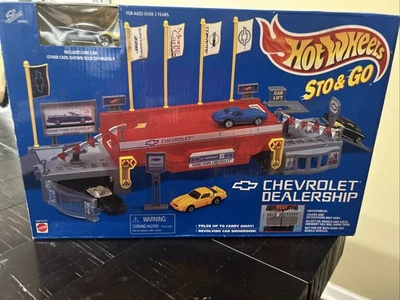 Concesionario de autos Hot Wheels vintage con Chevy 1:64 fundido a presión 1995 Sto & Go NUEVO Foto 1 de 4