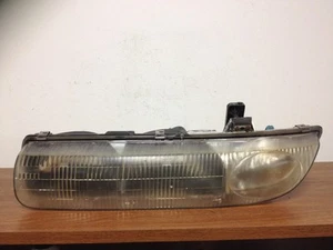 1996 SATURN SL LEFT/DRIVER HEADLIGHT 4DR OEM FREE SHIPPING - Picture 1 of 1