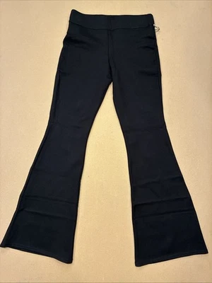 Pantalones Vince Camuto ajustados acampanados para mujer negros talla pequeña Foto 1 de 4