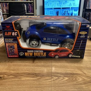 Quality Toys New Bright RC Blue VW BEETLE BUGGY 1:12 Scale 9.6V  Kmart price tag - Picture 1 of 8