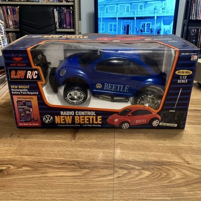 Juguetes de calidad nuevo brillante RC azul VW BEETLE BUGGY escala 1:12 9,6 V Kmart etiqueta de precio Foto 1 de 4