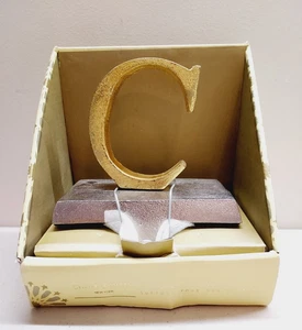 Soporte Medias Cynthia Rowley Monograma "C" Acabado Dorado Cepillado - Imagen 1 de 1